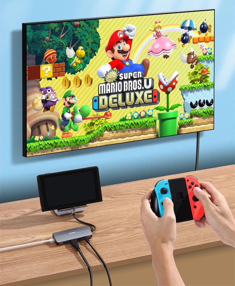 Nintendo Switch подключена к телевизору через хаб Kingma BMU034 и одновременно заряжается