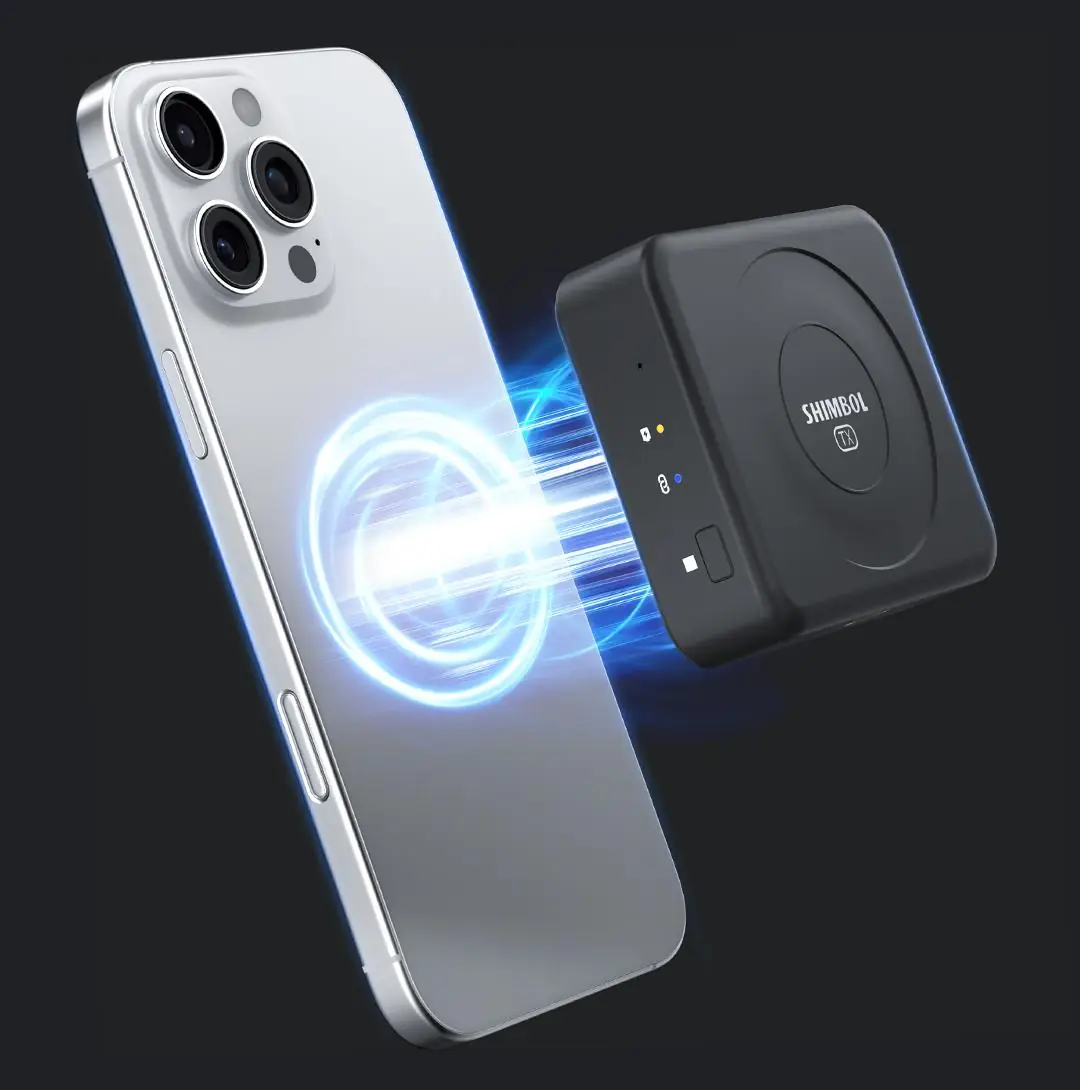 Передатчик Shimbol TP Nano примагничен к iPhone через MagSafe
