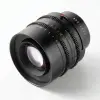 Объектив TTartisan 85 мм T2.1 Full Frame Cine Dual-Bokeh для Canon EOS R — вид спереди в три четверти на белом фоне