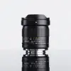Объектив TTArtisan 14 мм F2.8 ASPH для Sony E — вид сбоку, студийная съёмка