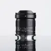 Объектив TTArtisan 14 мм F2.8 ASPH для Canon EOS R — вид сбоку, студийная съёмка